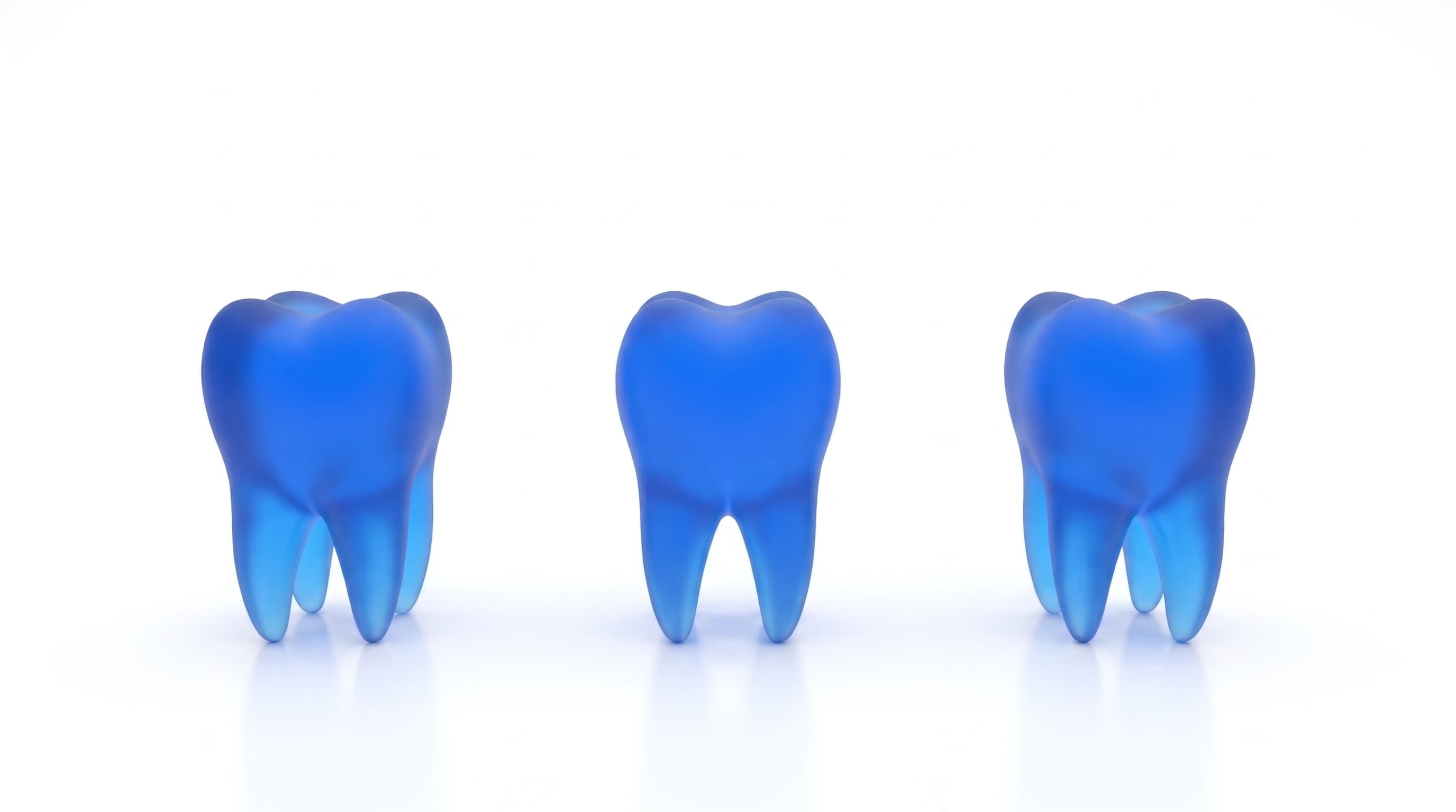 Tres dientes en tono azul representando las opciones de blanqueamiento dental